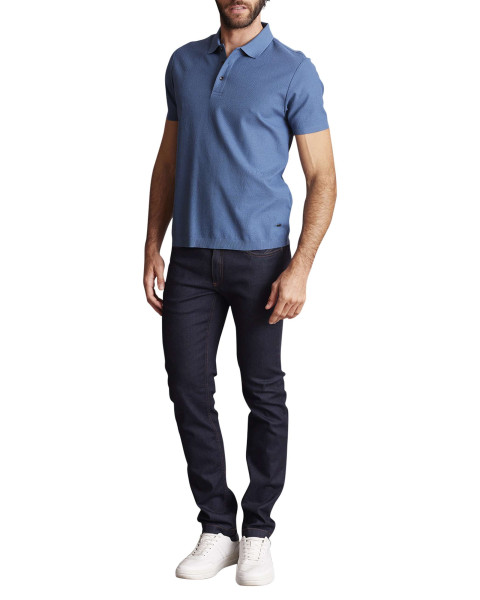 Polo en coton bleu uni à...