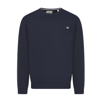 Pull en laine d'agneau marine uni avec une coupe droite et un col rond