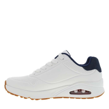 Baskets running blanches avec un talon compensé bas et des lacets