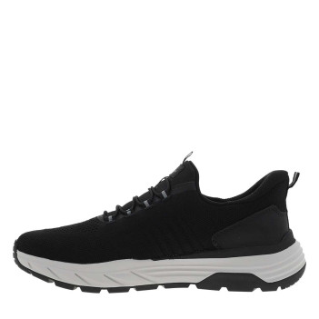 Sneakers noires à semelle plate avec une fermeture à slip-on
