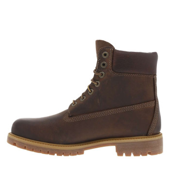 Bottines en cuir marron à talon décroché bas avec des lacets ronds