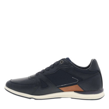 Sneakers bleu marine à talon plat avec un patch de la marque sur la languette