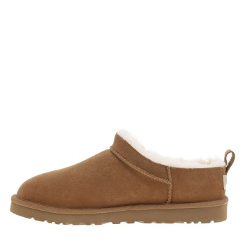 Mules naturelles en cuir avec un talon plat et fermeture à slip-on