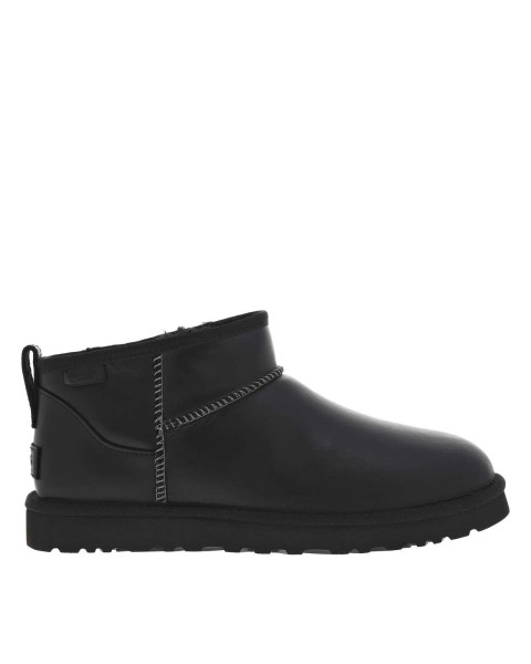 Boots en cuir noires à...
